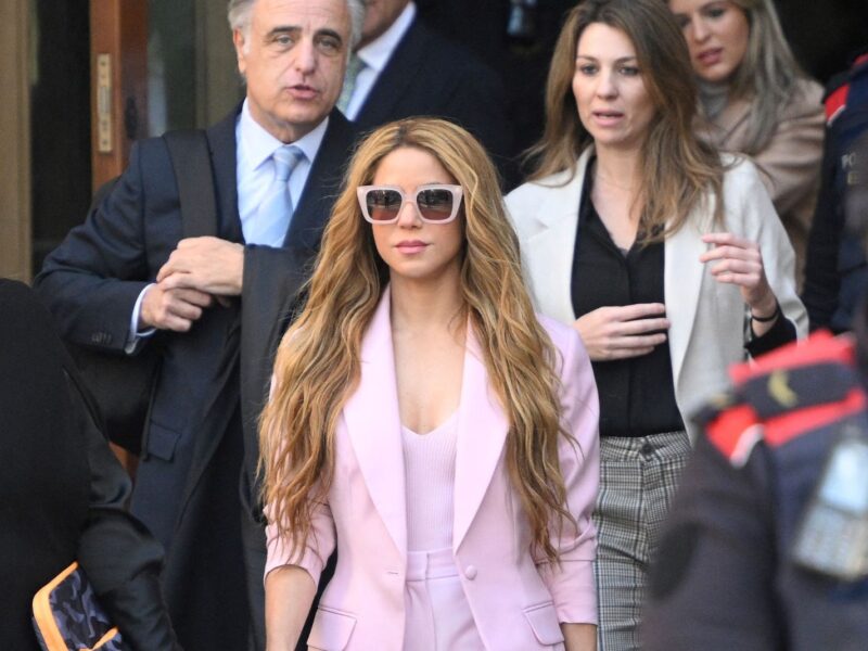 TOPSHOT - Colombian singer Shakira (C) leaves the High Court of Justice of Catalonia after attending her trial on tax fraud, in Barcelona on November 20, 2023. Colombian superstar Shakira has reached a deal with prosecutors to end her trial for allegedly defrauding the Spanish state of 14.5 million euros ($15.7 million) on income earned between 2012 and 2014, a Barcelona court said. Under the deal, the 46-year-old agreed to receive a three-year suspended sentence in exchange for paying millions of euros in fines, the head of the court said on what would have been the first day of her trial. (Photo by Josep LAGO / AFP) (Photo by JOSEP LAGO/AFP via Getty Images)