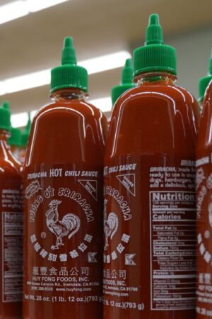 NEW JERSEY, UNITED STATES - JUNE 09: A photo of Sriracha Hot Chili Sauce made by the California-based Huy Fong Foods, which is one of the most popular hot sauces, in New Jersey, United States on June 09, 2022. Chili shortage forces Srirachaâs maker to suspend spicy sauce production. (Photo by Lokman Vural Elibol/Anadolu Agency via Getty Images)