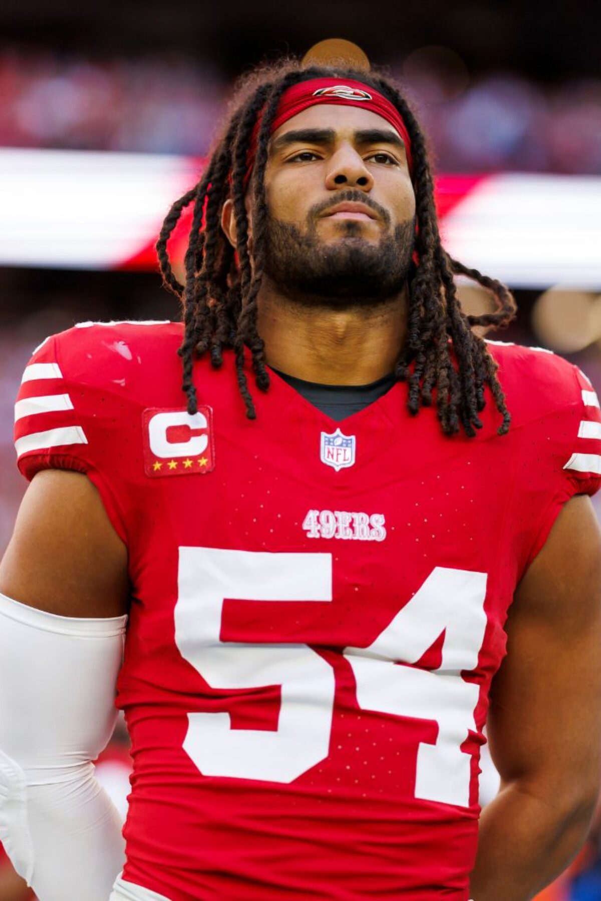 GLENDALE, ARIZONA - DECEMBER 17: Fred Warner #54 of the San Francisco 49ers looks on from the sideline before an NFL football game against the Arizona Cardinals at State Farm Stadium on December 17, 2023 in Glendale, Arizona. (Photo by Ryan Kang/Getty Images)