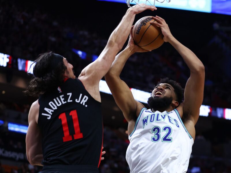 MIAMI, FLORIDA - DECEMBER 18: Jaime Jaquez Jr. #11 of the Miami Heat blocks a shot by Karl-Anthony Towns #32 of the Minnesota Timberwolves during the first quarter of the game at Kaseya Center on December 18, 2023 in Miami, Florida. NOTE TO USER: User expressly acknowledges and agrees that, by downloading and or using this photograph, User is consenting to the terms and conditions of the Getty Images License Agreement. (Photo by Megan Briggs/Getty Images)