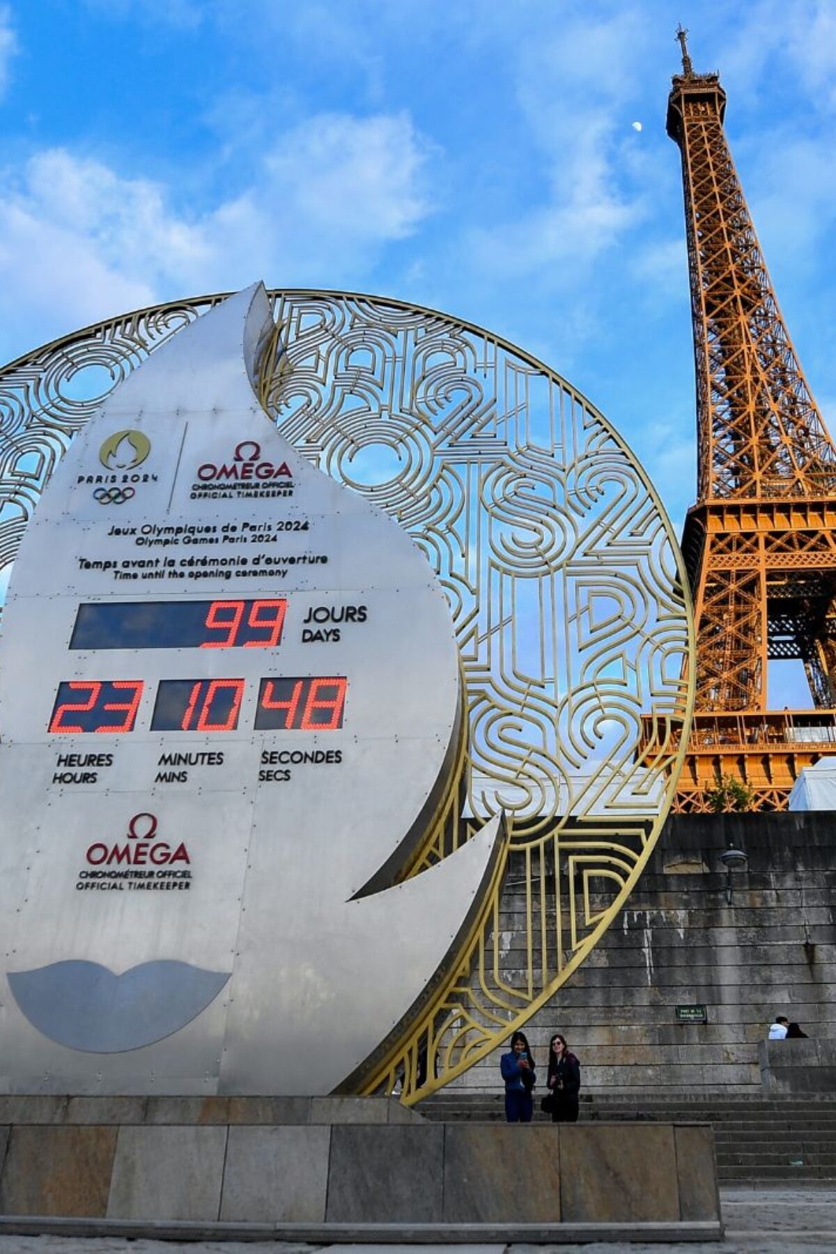 PARIS, FRANCE - APRIL 17: The official Omega Olympic countdown clock located beside the River Seine displays the remaining days until the Opening Ceremony of the Paris 2024 Olympic Games on April 17, 2024 in Paris, France. Paris will host the Summer Olympics from July 26 till August 11, 2024.(Photo by Franco Arland/Getty Images)