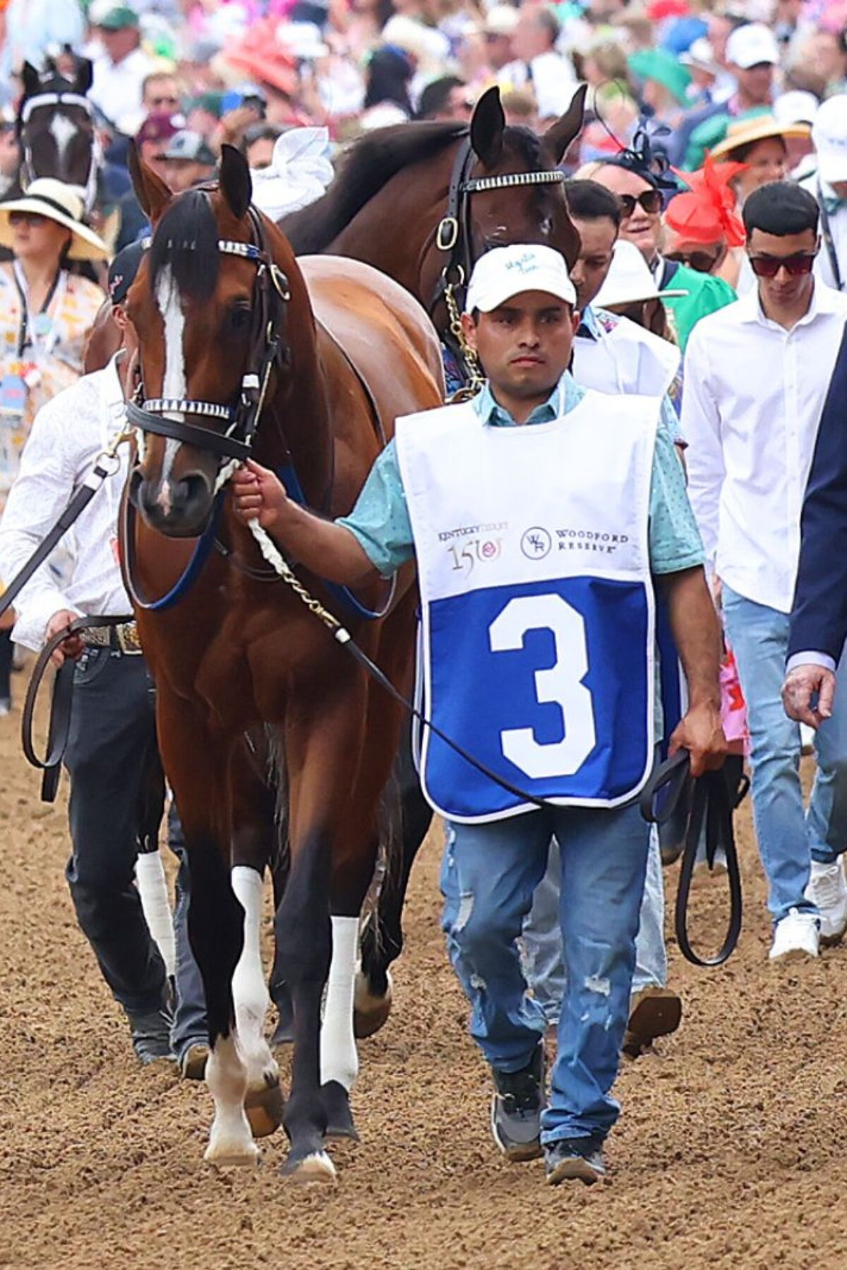 LOUISVILLE, KY - MAY 04: Mystik Dan walks from the backside of the track with Oswaldo Salazar to the paddock before the 150th running of the Kentucky Derby on May 4, 2024, at Churchill Downs in Louisville, Ky. (Photo by Jeff Moreland/Icon Sportswire via Getty Images)