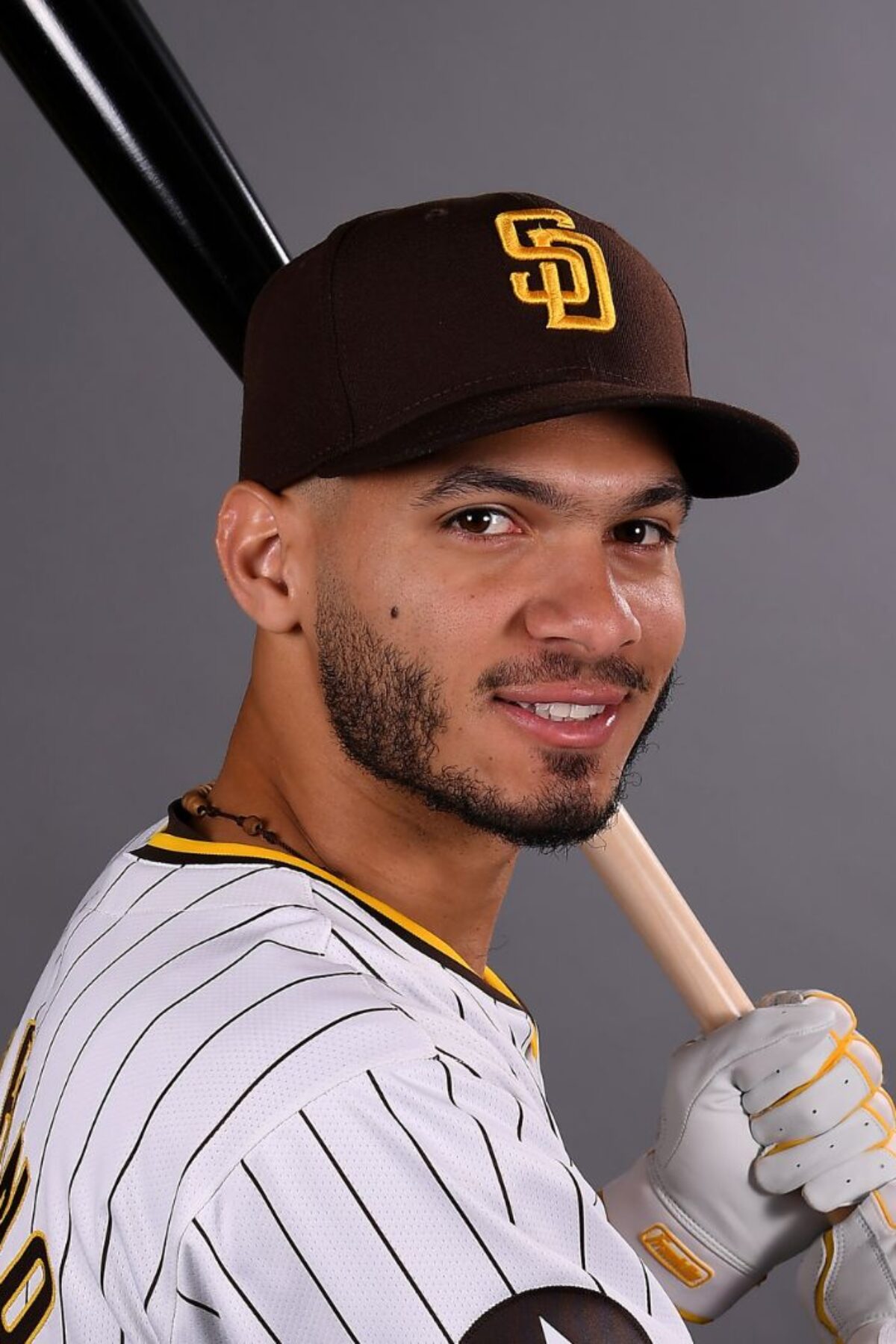 PEORIA, ARIZONA - FEBRUARY 20: Tucupita Marcano #12 of the San Diego Padres poses for a portrait during Photo Day at the Peoria Sports Complex on February 20, 2024 in Peoria, Arizona. (Photo by Norm Hall/Getty Images)