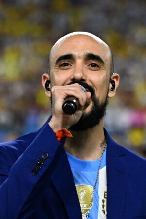 Argentine singer Abel Pintos sings Argentina national anthem before the Conmebol 2024 Copa America tournament final football match between Argentina and Colombia at the Hard Rock Stadium, in Miami, Florida on July 14, 2024. (Photo by Chandan Khanna / AFP) (Photo by CHANDAN KHANNA/AFP via Getty Images)