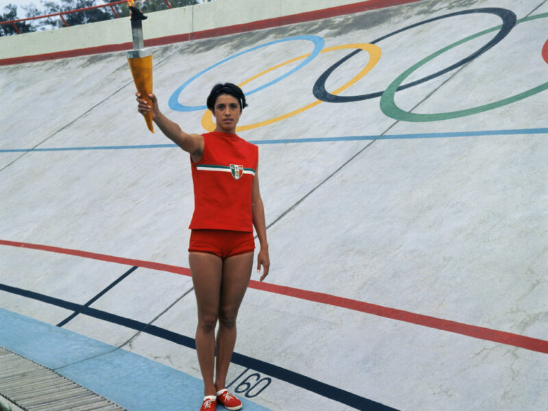 Enriqueta Basilio Waving on Olympic Grounds