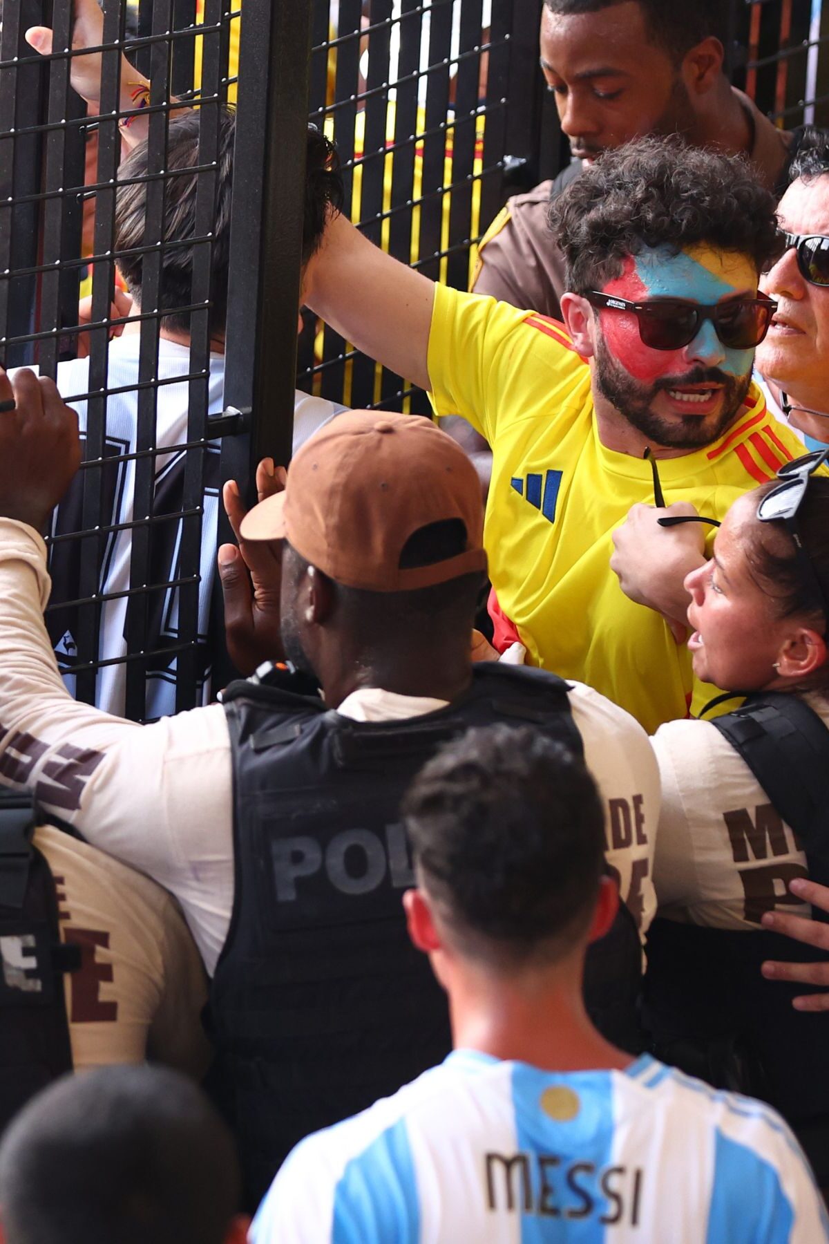 MIAMI GARDENS, FLORIDA - JULY 14: Fans try to enter the stadium amid disturbances prior to the CONMEBOL Copa America 2024 Final match between Argentina and Colombia at Hard Rock Stadium on July 14, 2024 in Miami Gardens, Florida. (Photo by Maddie Meyer/Getty Images)