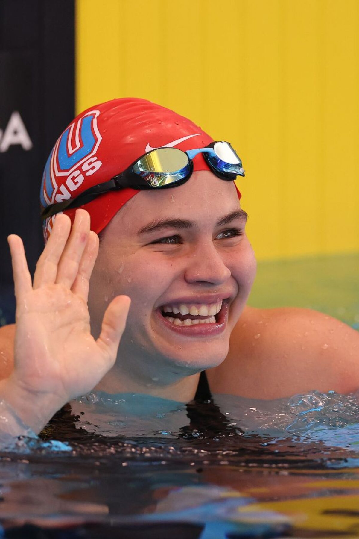 WESTMONT, ILLINOIS - APRIL 13: Luana Alonso of Paraguay reacts after winning the Women's 100 Meter Butterfly consolation on Day 2 of the TYR Pro Swim Series Westmont on April 13, 2023 in Westmont, Illinois. (Photo by Michael Reaves/Getty Images)