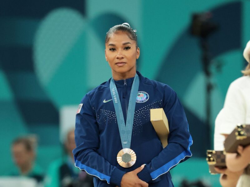 PARIS, FRANCE - AUGUST 05: Bronze medalist Jordan Chiles (R) of Team United States poses on the podium at the Artistic Gymnastics Women's Floor Exercise Medal Ceremony on day ten of the Olympic Games Paris 2024 at Bercy Arena on August 05, 2024 in Paris, France. (Photo by Jean Catuffe/Getty Images)