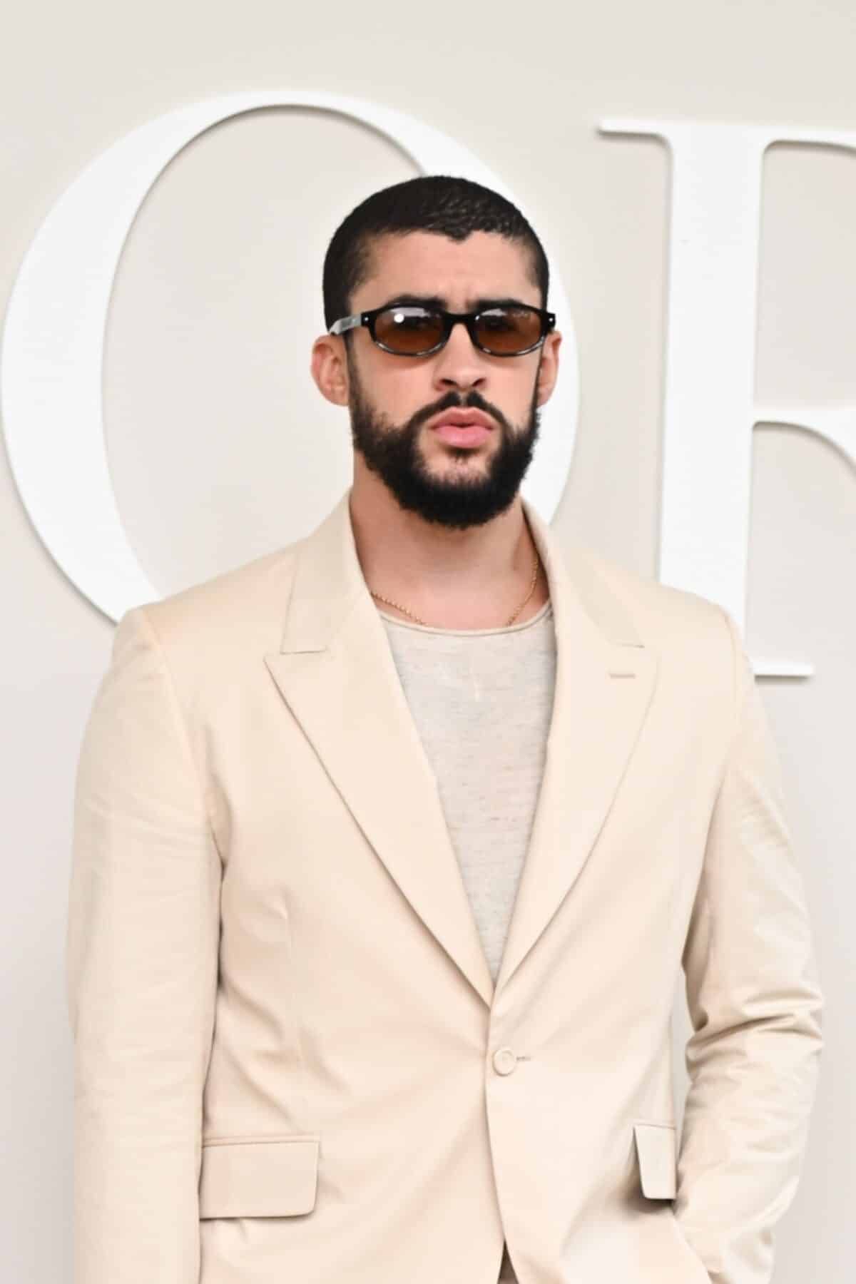 PARIS, FRANCE - JUNE 21: (EDITORIAL USE ONLY - For Non-Editorial use please seek approval from Fashion House) Bad Bunny attends the Dior Homme Menswear Spring/Summer 2025 show as part of Paris Fashion Week on June 21, 2024 in Paris, France. (Photo by Stephane Cardinale - Corbis/Corbis via Getty Images)