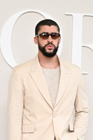 PARIS, FRANCE - JUNE 21: (EDITORIAL USE ONLY - For Non-Editorial use please seek approval from Fashion House) Bad Bunny attends the Dior Homme Menswear Spring/Summer 2025 show as part of Paris Fashion Week on June 21, 2024 in Paris, France. (Photo by Stephane Cardinale - Corbis/Corbis via Getty Images)