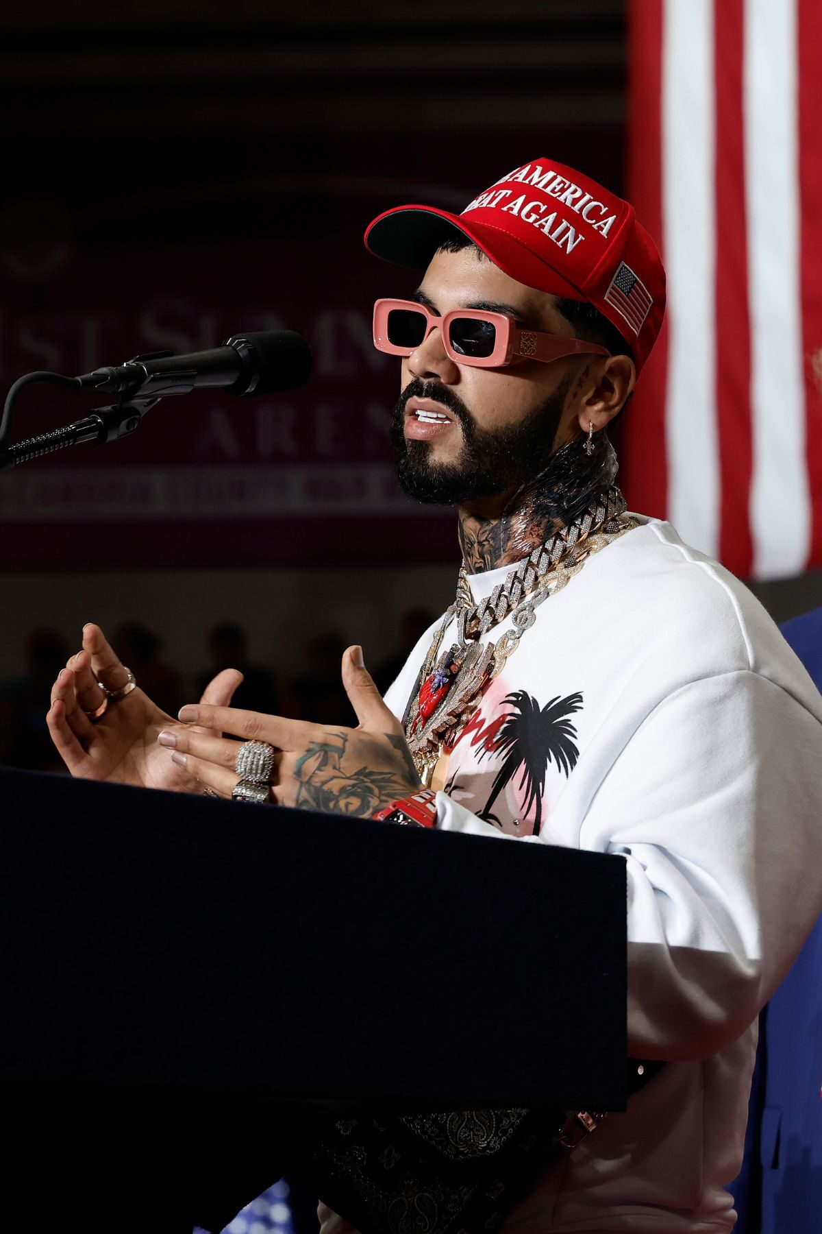 JOHNSTOWN, PENNSYLVANIA - AUGUST 30: Puerto Rican rapper Anuel AA (L) joins Republican presidential nominee, former U.S. President Donald Trump during a campaign rally in the 1st Summit Arena at the Cambria County War Memorial on August 30, 2024 in Johnstown, Pennsylvania. Promising to cut energy bills in half, conduct the largest deportation operation in history and put a 200% tariff on foreign made automobiles, Trump rallied his supporters in the all-important battleground state of Pennsylvania. (Photo by Chip Somodevilla/Getty Images)