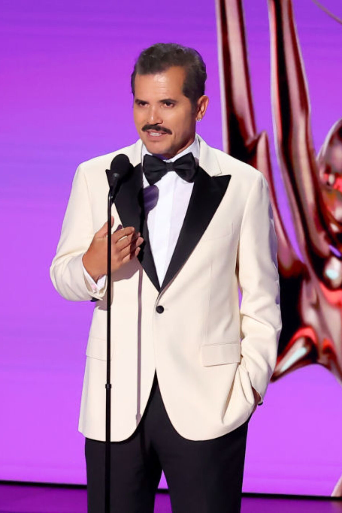 John Leguizamo speaks onstage during the 76th Primetime Emmy Awards.