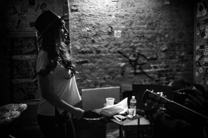 Orange Is the New Black Season 2 premier, Jackie Cruz warming up backstage. Photo by: Javier Romero.