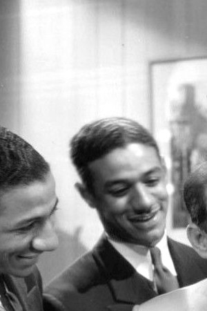 Photo of Jimmy Durante, Lupe Vélez and the Mills Brothers from the 1934 film ''Strictly Dynamite''. This work is in the public domain.