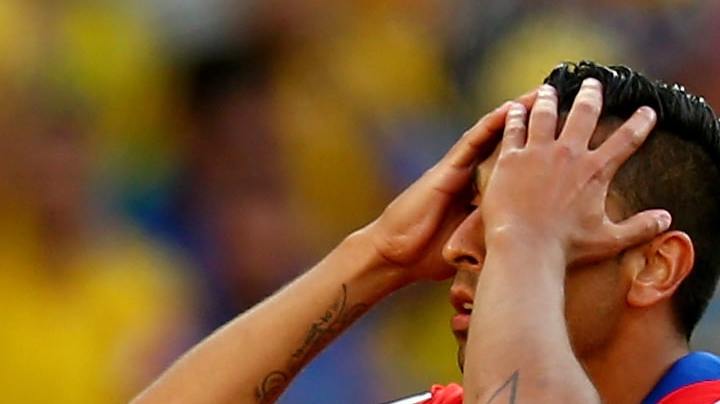 Gonzalo Jara of Chile reacts after being defeated by Brazil in a penalty shootout during the 2014 FIFA World Cup Brazil round of 16 match between Brazil and Chile at Estadio Mineirao on June 28, 2014 in Belo Horizonte, Brazil. Photo by Ronald Martinez/Getty Images