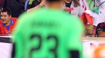 Jul 19, 2015; East Rutherford, NJ, USA; Mexico midfielder Andres Guardado (18) celebrates with teammates after kicking a penalty kick to score a goal against Costa Rica goalkeeper Esteban Alvarado (23) during stoppage time of the overtime period of a CONCACAF Gold Cup quarterfinal match at MetLife Stadium. Mexico won 1-0 in overtime. Mandatory Credit: Brad Penner-USA TODAY Sports ORG XMIT: USATSI-230456 ORIG FILE ID:  20150719_ads_ae5_226.JPG