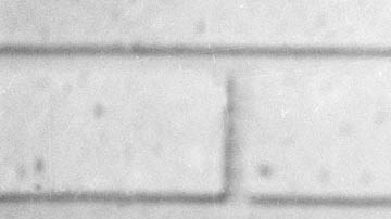 Fidel Castro, Prime Minister of Cuba, smokes a cigar during his meeting with two U.S. senators, the first to visit Castro's Cuba, in Havana, Cuba, Sept. 29, 1974.  (AP Photo)