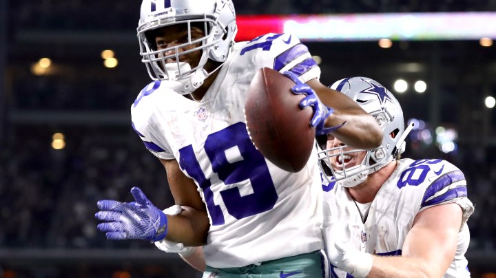 Amari Cooper #19 of the Dallas Cowboys celebrates with Blake Jarwin #89 after a touchdown against the Philadelphia Eagles in overtime for a 29-23 win at AT&T Stadium on December 09, 2018 in Arlington, Texas. Photo by Ronald Martinez/Getty Images
