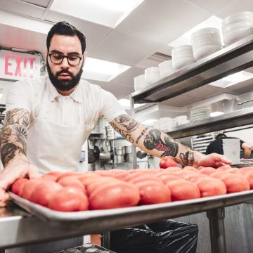 After going to the local farmers market, Chef Luis Herrera preps for Cosme’s daily staff lunch. Photo by Itzel Alejandra Martinez for Remezcla