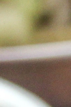 Choriburgers made of chorizo patty, cheese, homemade bacon, and mango marmalade. Photo by Kevin Vaughn for Remezcla