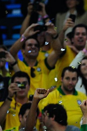 Brazil lifting the 2013 Confederations Cup trophy. (Photo is licensed under the CC BY 2.0)