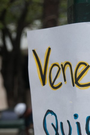 Creative Commons "Banner at demonstrations and protests against Chavismo and Nicolas Maduro government” by The Photographer is licensed under CC BY 1.0