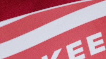 Mexican immigrant Nieves Ojendiz holds her 4-year old daughter Jane as she attends an immigration reform rally with members and supporters of the New York Immigration Coalition. Photo by rew Angerer/Getty Images News