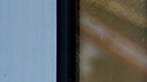 Jerome Farah stands in a repurposed telephone booth in Times Square listening to artist Aman Mojadidi interactive public art installation 'Once Upon a Place' on June 27, 2017 in New York City. Photo by Spencer Platt/Getty Images News