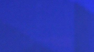 Maluma accepts an award on stage during Univision's Premios Juventud.  Photo by Rodrigo Varela/Getty Images Entertainment