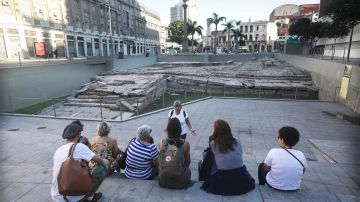 Visitors gather at the Valongo slave wharf, entry point in the Americas for nearly one million African slaves, on July 11, 2017 in Rio de Janeiro, Brazil.  Photo by Mario Tama/Getty Images