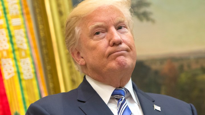 U.S. President Donald J. Trump listens during a Department of Veterans Affairs announcement. Photo by Chris Kleponis-Pool/Getty Images News