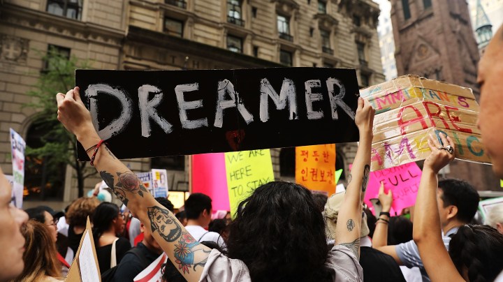 Dozens of immigration advocates and supporters attend a rally outside of Trump Tower along Fifth Avenue on August 15, 2017 in New York City. Photo by Spencer Platt/Getty Images News