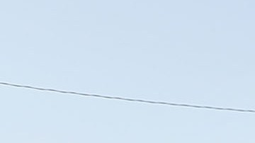 A couple walk through their flooded neighborhood as Texas slowly moves toward recovery from the devastation of Hurricane Harvey. Photo by Spencer Platt/Getty Images News