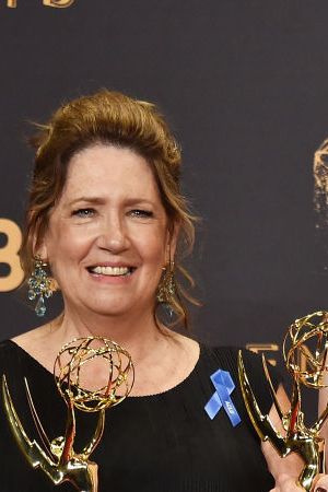 Actors Ann Dowd, winner of Outstanding Supporting Actress in a Drama Series for 'The Handmaid's Tale', Elisabeth Moss, winner of Outstanding Lead Actress in a Drama Series for 'The Handmaid's Tale' and Alexis Bledel pose in the press room during the 69th Annual Primetime Emmy Awards. Photo by Alberto E. Rodriguez/Getty Images