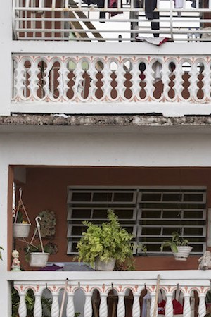 Residents wade through flood waters at their home days after Hurricane Maria made landfall, on September 22, 2017 in Loiza, Puerto Rico. Photo by Alex Wroblewski/Getty Images News