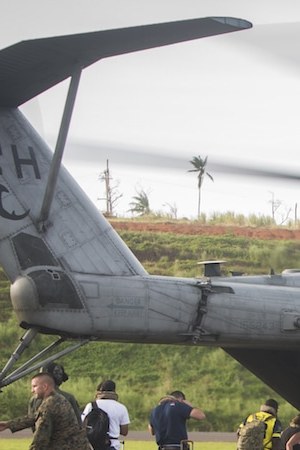 In this handout image provided by the U.S.Navy,  U.S. citizens board a U.S. Marine Corps CH-53E Super Stallion helicopter. Photo by   Ian Leonesz/US Marine Corps via Getty Images News
