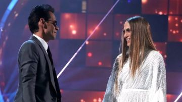 Marc Anthony (L) and Jennifer Lopez perform onstage during The 17th Annual Latin Grammy Awards at T-Mobile Arena. Photo by Christopher Polk/Getty Images for LARAS