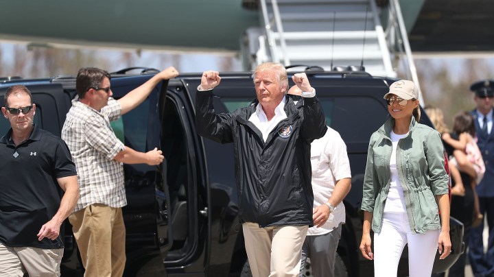 President Donald Trump and Melania Trump arrive on Air Force One at the Muniz Air National Guard Base for a visit after Hurricane Maria hit the island. Photo by Joe Raedle/Getty Images