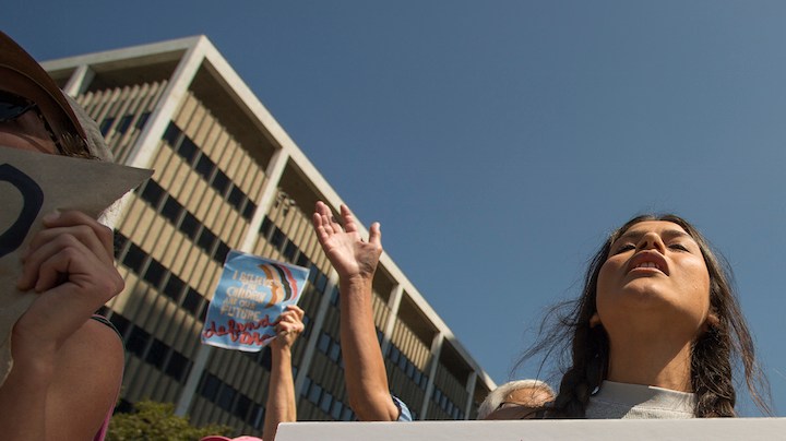 Immigrants and supporters rally after President Trump ordered an end to DACA on September 5, 2017 in Los Angeles. Photo by David McNew/Getty Images News