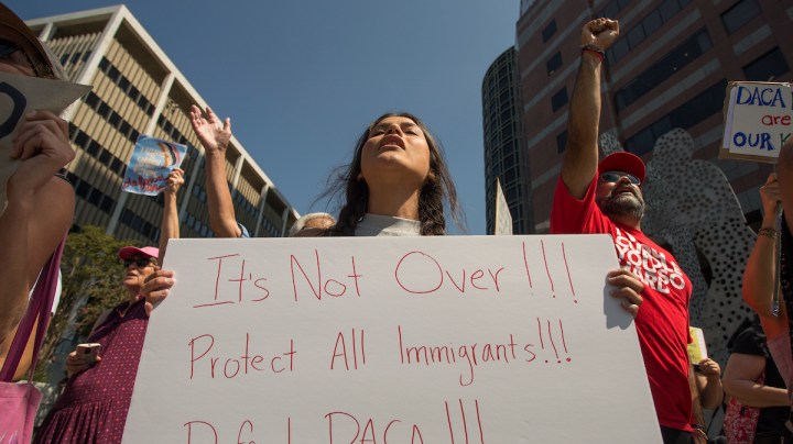 Immigrants and supporters rally after President Trump ordered an end to DACA on September 5, 2017 in Los Angeles. Photo by David McNew/Getty Images News