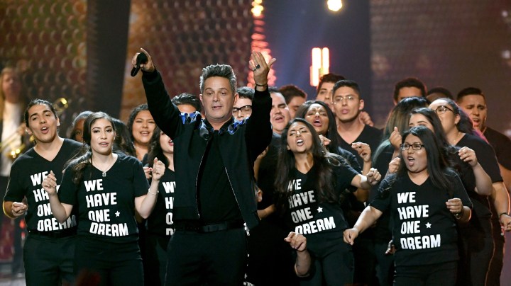 Honoree Alejandro Sanz performs with a group of 'DREAMers' onstage at the 18th Annual Latin Grammy Awards. Photo by Kevin Winter/Getty Images Entertainment