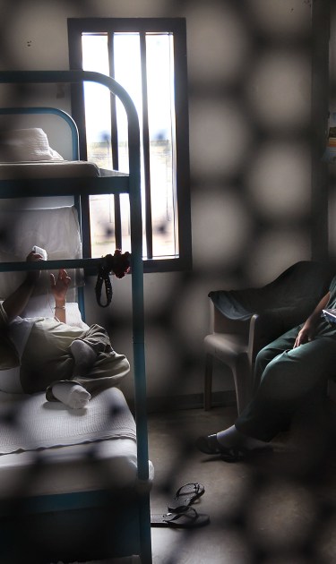 Immigrants sit in their housing cell in the women's wing of the detention facility for illegal immigrants on July 30, 2010 in Eloy, Arizona. Photo by John Moore/Getty Images News