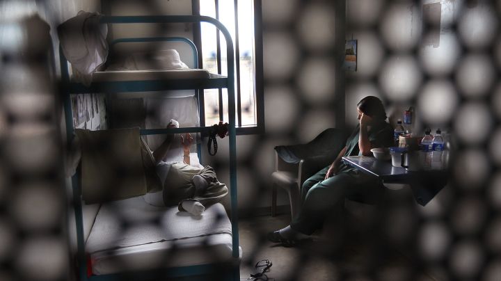 Immigrants sit in their housing cell in the women's wing of the detention facility for illegal immigrants on July 30, 2010 in Eloy, Arizona. Photo by John Moore/Getty Images News