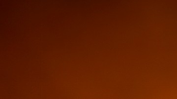 Firefighters use drip torches to set a backfire at night in an effort to make progress against the Thomas Fire before the winds return with the daylight near Lake Casitas. Photo by David McNew/Getty Images News