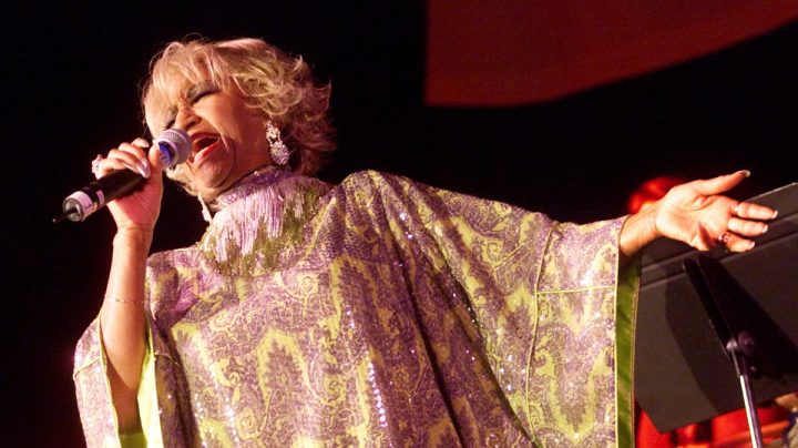 Celia Cruz performing at the "Concierto Para Los Heroes" benefit sponsored by The Recording Academy at the Beverly Hilton Hotel in Los Angeles, Ca. 9/14/01. The show will benefit the families of fallen firefighters and police officers of New York City. Photo by Kevin Winter/Getty Images.