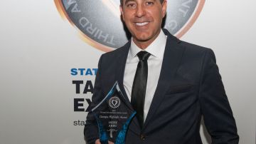 Ozzie Areu receives the "Georgia Highlight" award during the 3rd Annual Georgia Entertainment Gala at Georgia World Congress Center on January 10, 2015 in Atlanta, Georgia. Photo by Marcus Ingram/Getty Images