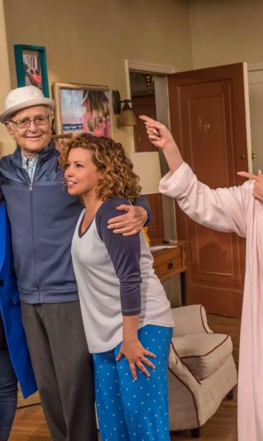 One Day at a Time’s showrunners Mike Royce (from left) and Gloria Calderon Kellett pose for a photo with executive producer Norman Lear and cast members Justina Machado and Rita Moreno. Courtesy of Netflix.