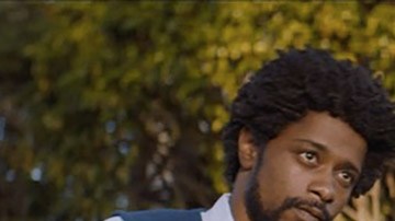 Lakeith Stanfield and Tessa Thompson appear in 'Sorry to Bother You.' Photo by Doug Emmett.   Courtesy of Sundance Institute