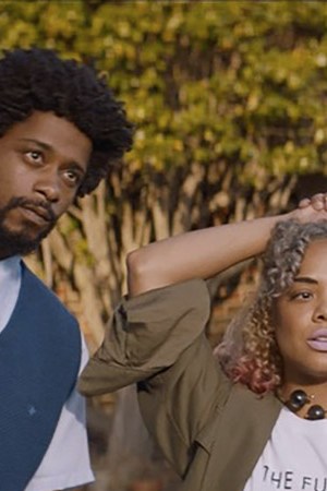 Lakeith Stanfield and Tessa Thompson appear in 'Sorry to Bother You.' Photo by Doug Emmett.   Courtesy of Sundance Institute