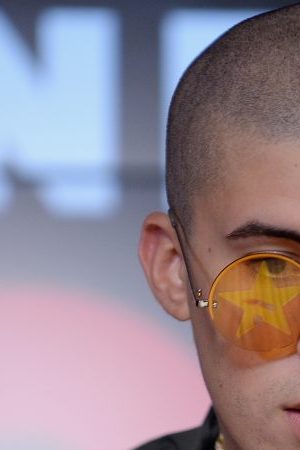 Bad Bunny poses in the pressroom at One Voice: Somos Live! A Concert For Disaster Relief at Marlins Park . Photo by Jason Koerner/One Voice: Somos Live!/Getty Images